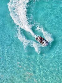 High angle view of person surfing in sea