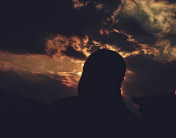 Silhouette of man at sunset