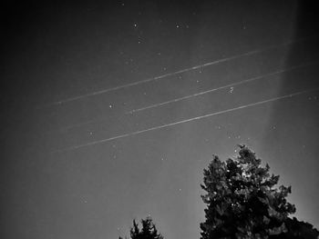 Low angle view of vapor trails in sky