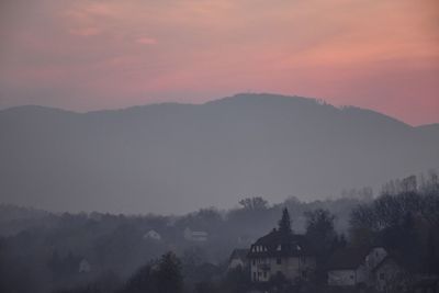 Scenic view of mountains against sky during sunset