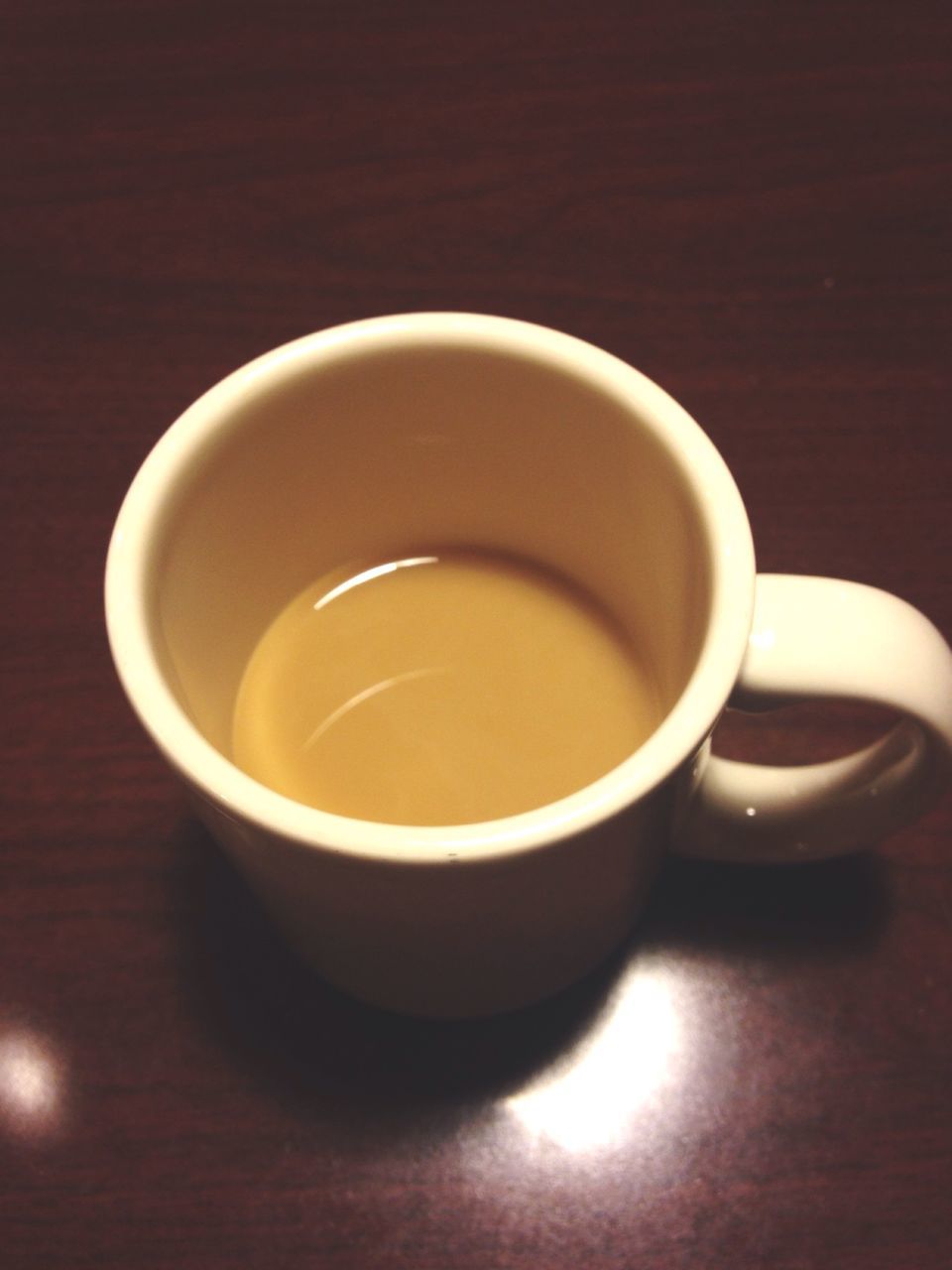 indoors, coffee cup, drink, refreshment, food and drink, table, saucer, coffee - drink, still life, cup, coffee, freshness, close-up, tea cup, directly above, high angle view, beverage, tea, no people, wood - material