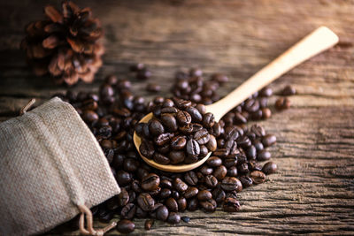 Close-up of coffee beans on table