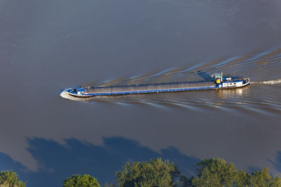 Aerial view of the barge on the danube river and its floodplain in serbiaand croatia