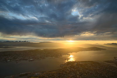 Scenic view of landscape against sky during sunset