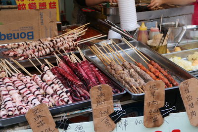 Variety of food for sale at market stall