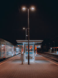 Illuminated street light at night
