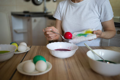 Midsection of woman holding food