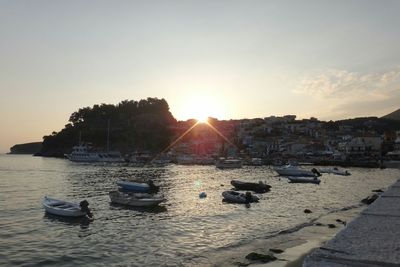 Scenic view of calm sea at sunset