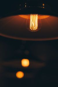 Close-up of illuminated light bulb