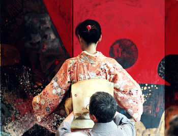 Close-up of woman standing in pond