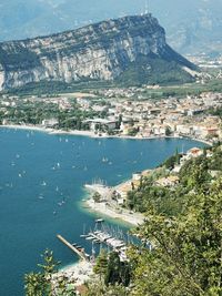 High angle view of townscape by sea