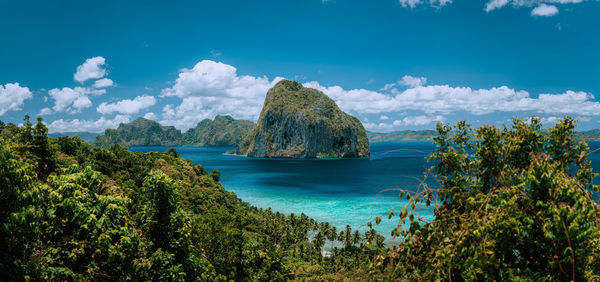 Panoramic view of bay against sky