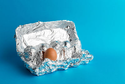 High angle view of bread against blue background