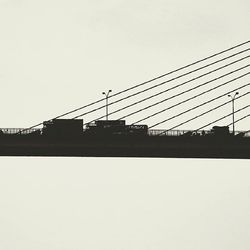 Low angle view of bridge against clear sky