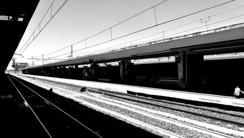 Railroad tracks on railroad station platform