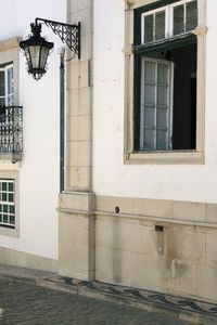 Street light on wall of building