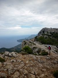 Scenic view of sea against cloudy sky