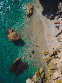 High angle view of rocks on beach