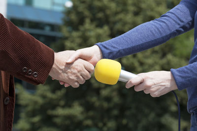 Close-up of hand holding hands