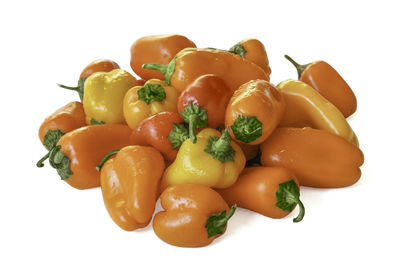 Close-up of fruits against white background