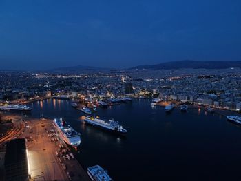 High angle view of illuminated buildings in city at night