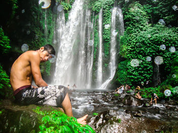 View of waterfall in forest