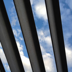 Low angle view of metal structure against sky