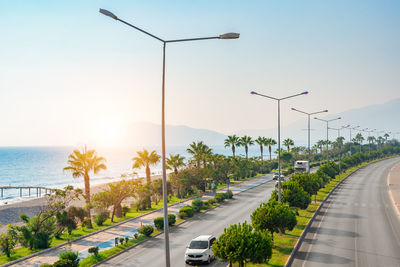 Road along the sea from gazipasa airport to alanya, turkey at sunset.