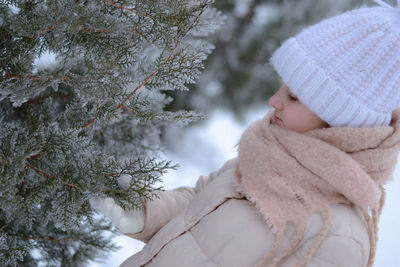 Rear view of woman wearing warm clothes