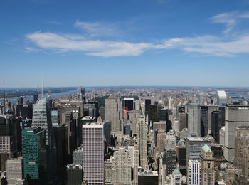 Aerial view of cityscape against sky