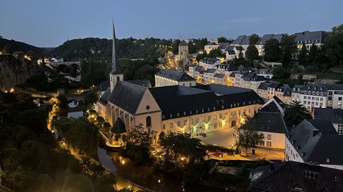 High angle view of illuminated buildings against sky