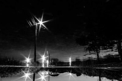 Illuminated street light at night