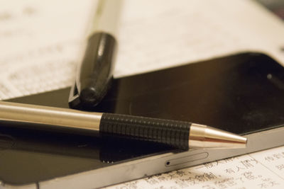 High angle view of pen on table