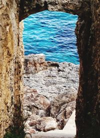 High angle view of rock formation in sea