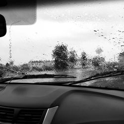 Wet car window in rainy season