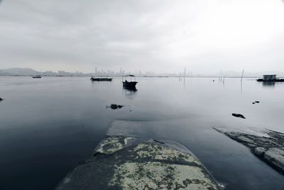 Scenic view of sea against sky during winter