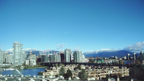 Cityscape against blue sky