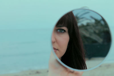 Close-up portrait of young woman