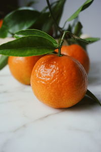 Close-up of orange fruit on table