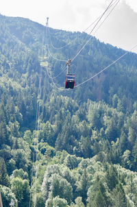 High angle view of overhead cable car against mountains