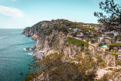 View of a beach and hills in tossa de mar, spain. coast of catalonia