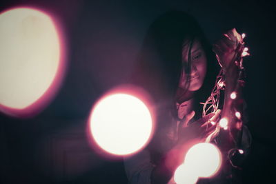 Light bulbs hanging on ceiling