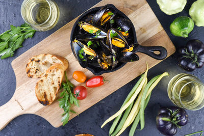 High angle view of vegetables on cutting board