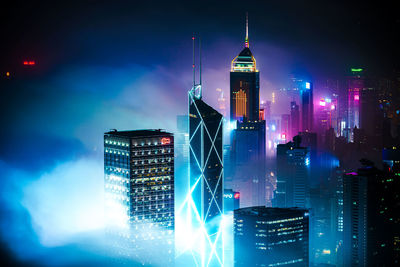 Illuminated buildings in city at night