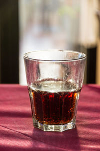 Close-up of beer in glass on table