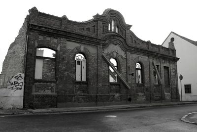 Low angle view of historic building against sky