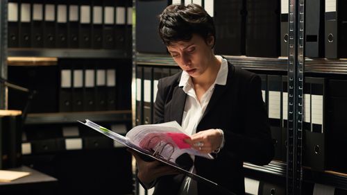 Businesswoman using mobile phone