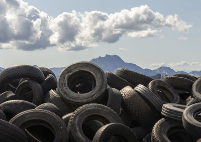 Stack of tires against alps