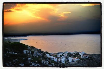 Scenic view of sea at sunset