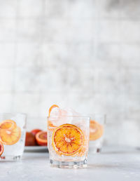 Tonic nonalcoholic mocktail with sicilian oranges and ice. cold refreshing summer mojito lemonade.